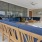 a room with blue couches and a table