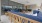a room with blue couches and a table