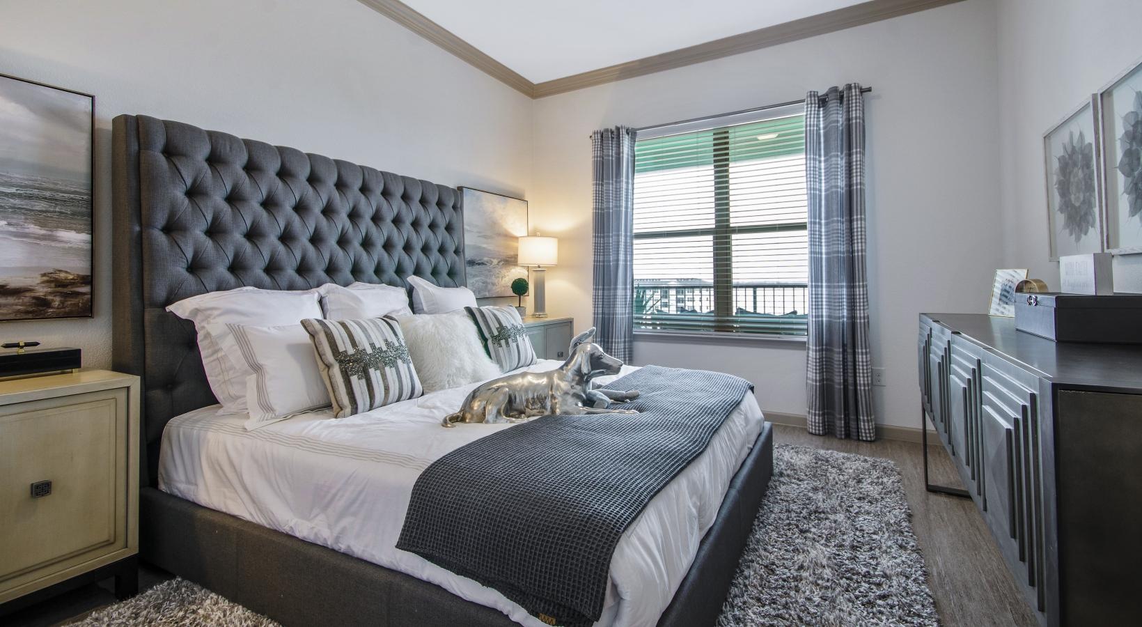 Beautiful bedrooms to fit every need a bedroom with a bed and a desk