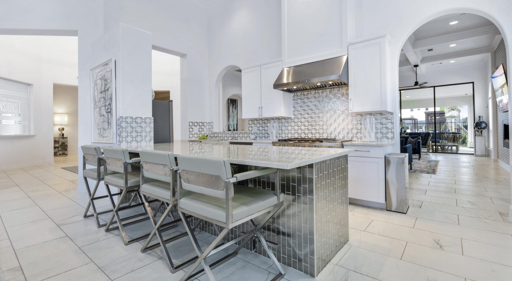 Settle into comfort at Park at Bayside a kitchen with a marble island