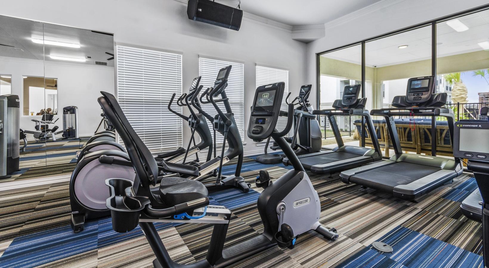 Quick access to state-of-the-art amenities a gym with exercise equipment