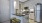 a kitchen with white cabinets