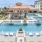 a pool with chairs around it