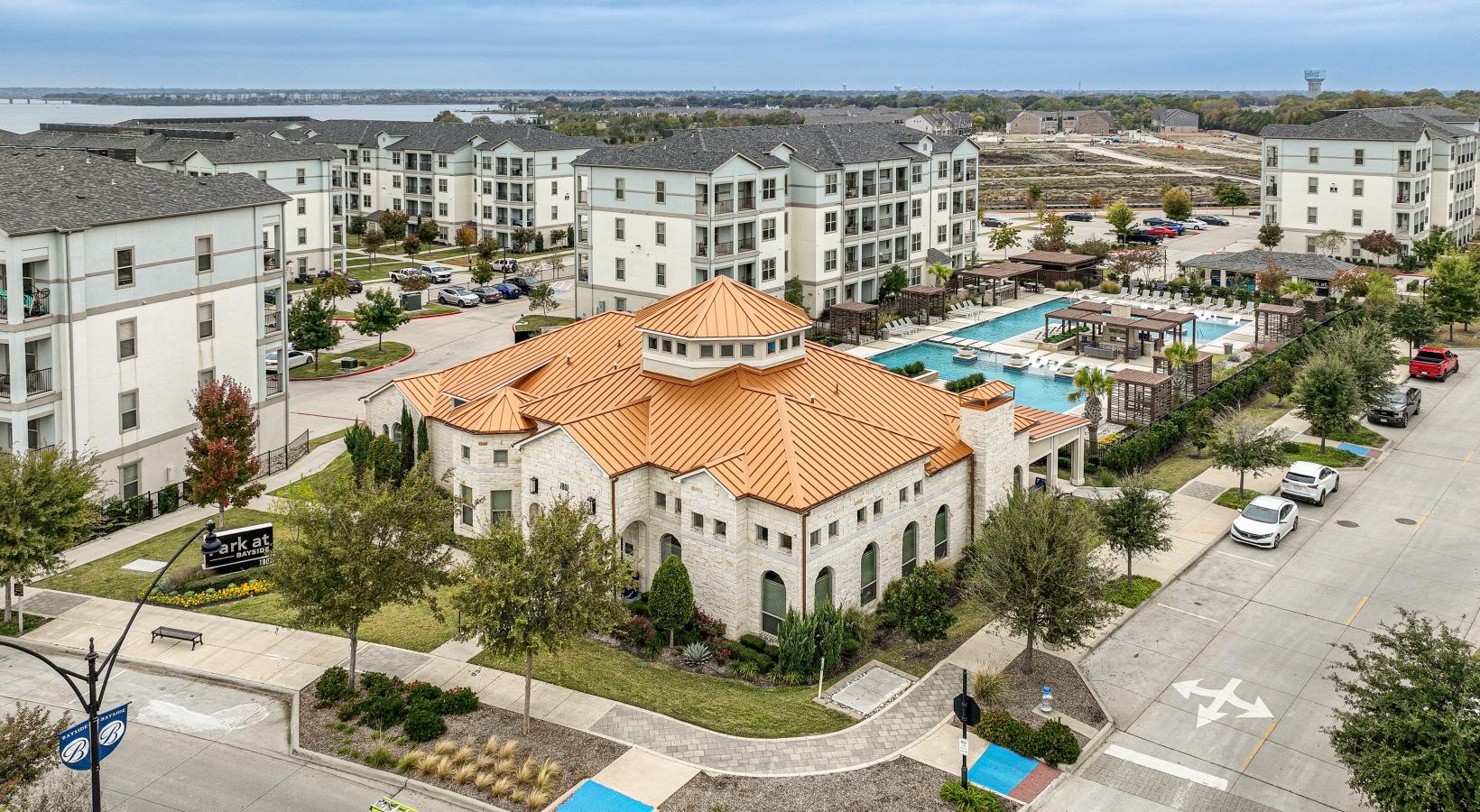 Find your perfect fit at Park at Bayside a large building with a parking lot