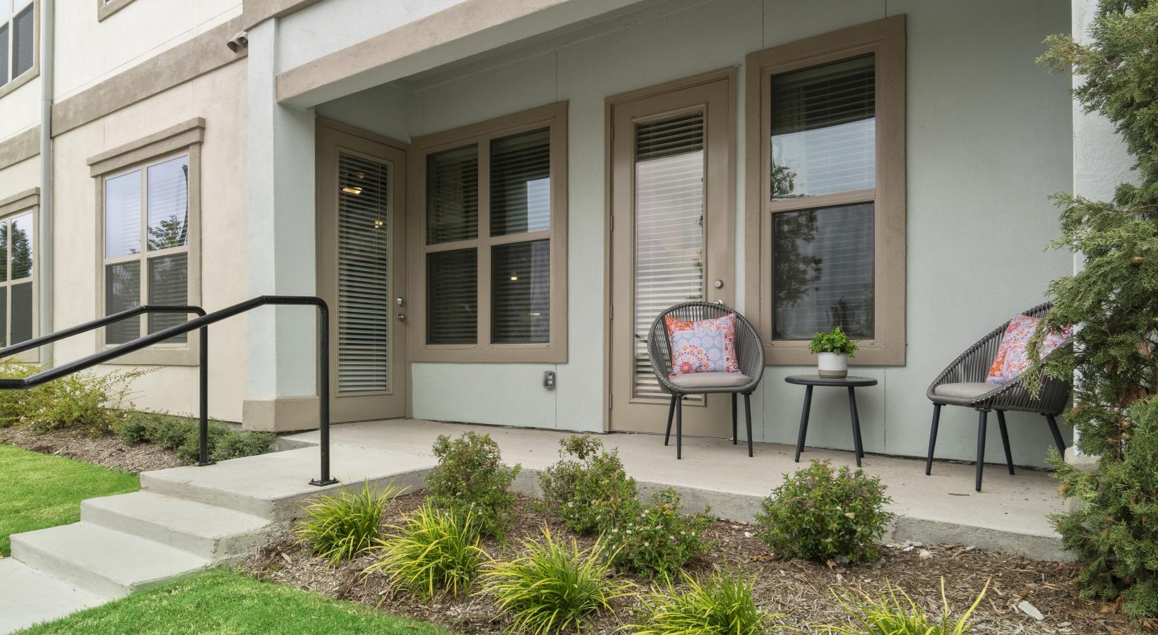 Find your perfect fit at Park at Bayside a house with a patio and a table and chairs in the front