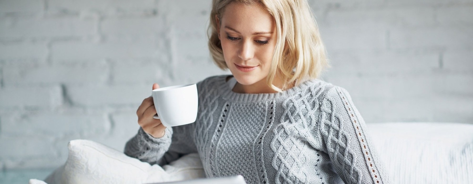 a woman drinking coffee