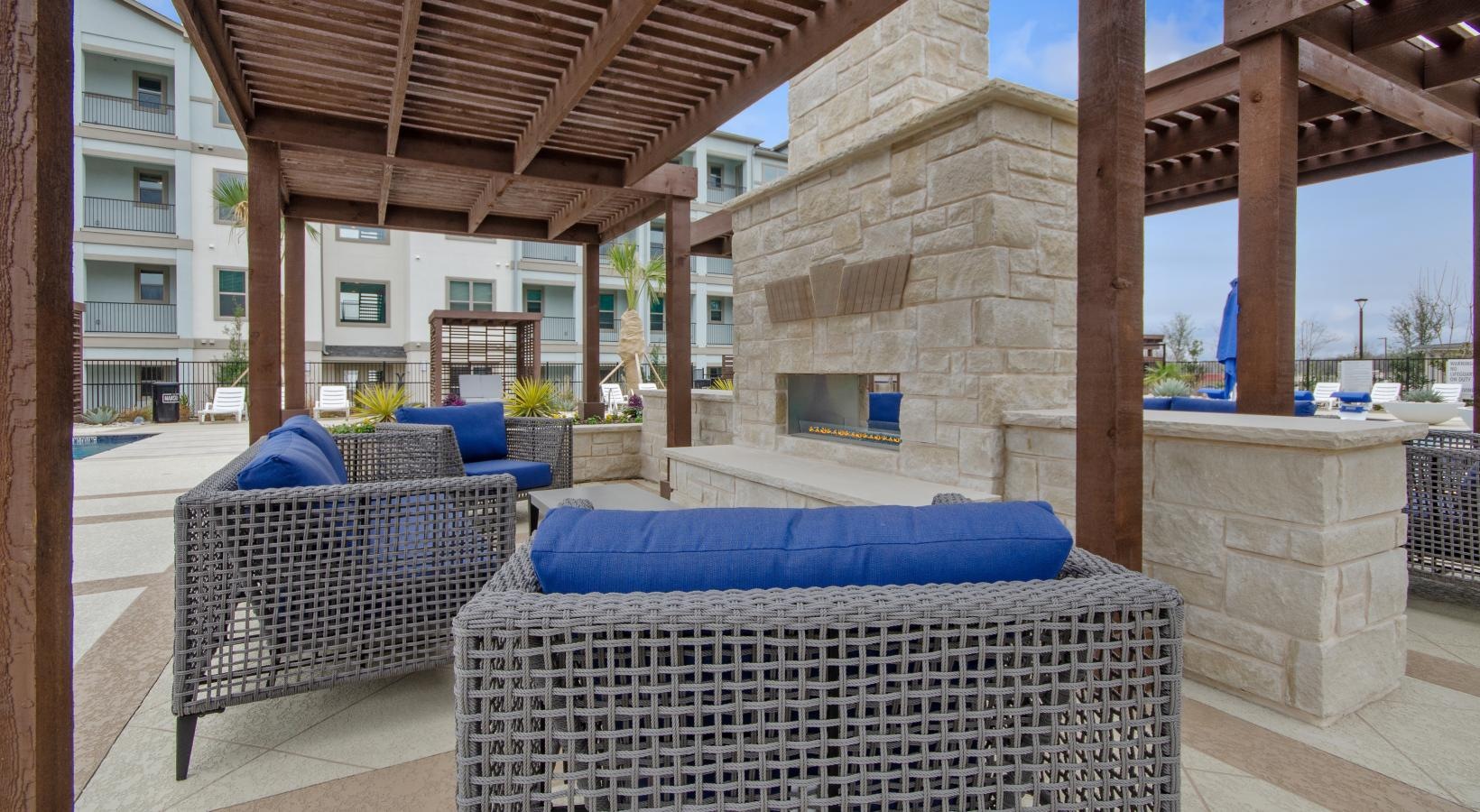 The essence of exceptional living a patio with a couch and chairs