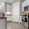 a kitchen with white cabinets