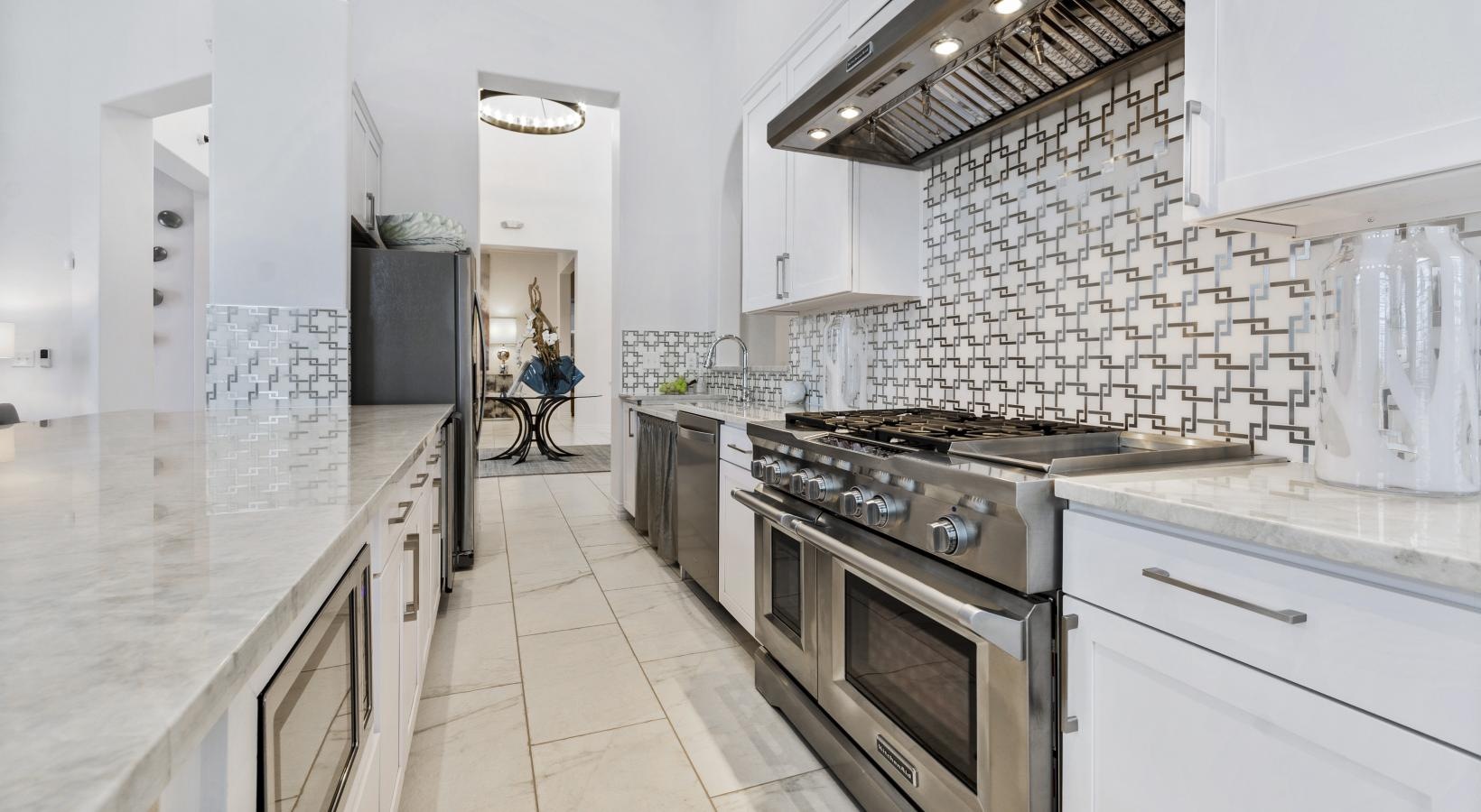 Settle into comfort at Park at Bayside a kitchen with white tiles