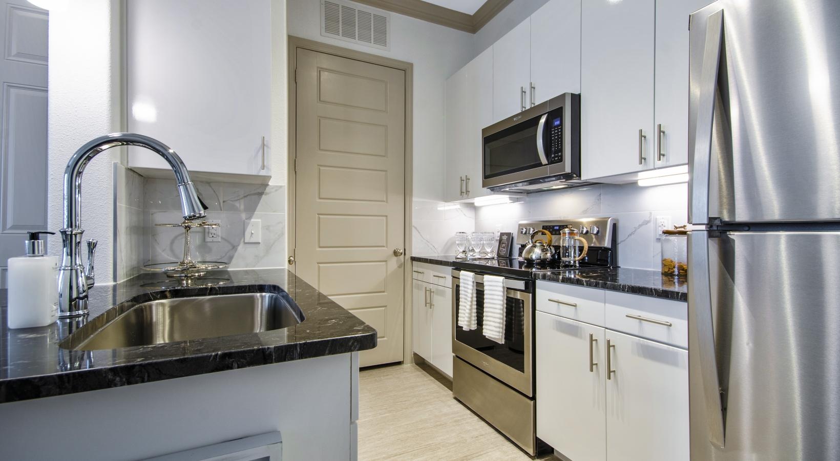 Beautiful kitchens with designer finishes a kitchen with white cabinets