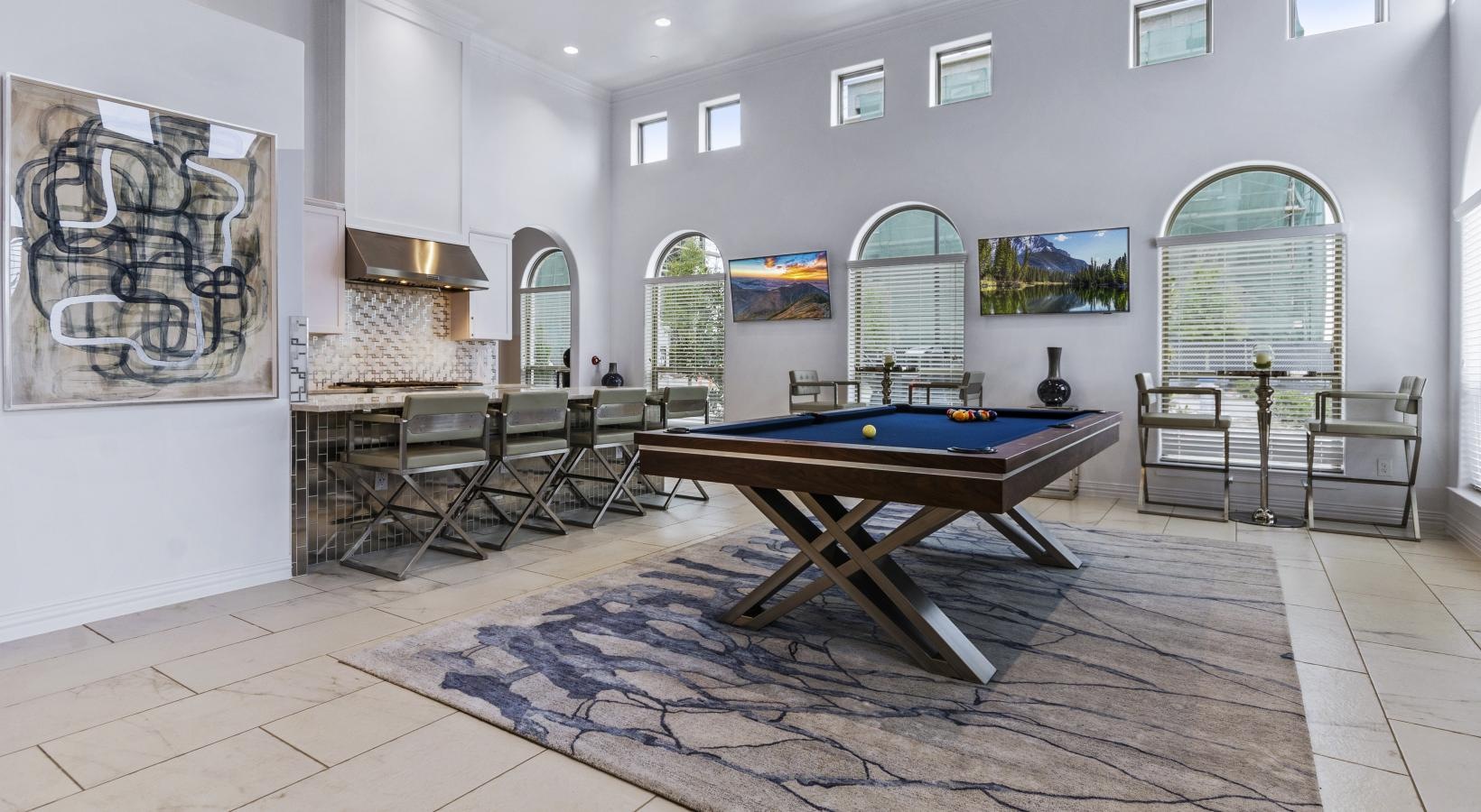 Find your perfect fit at Park at Bayside a room with a pool table and chairs